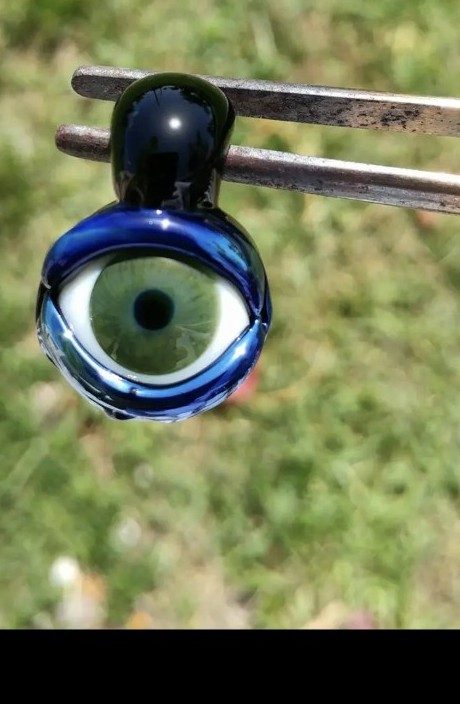 Blue borosilicate glass eye pendant by Jose Valdes