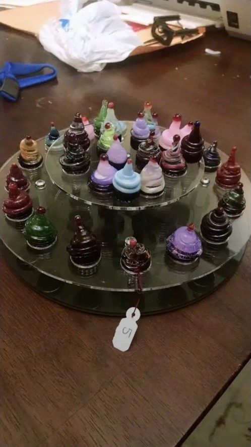 Collection of colorful borosilicate glass cupcakes by Jose Valdes