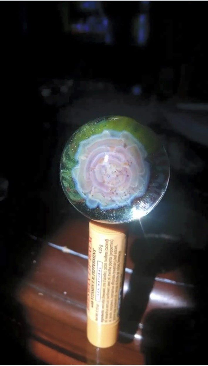 Pink borosilicate glass implosion flower marble by Jose Valdes