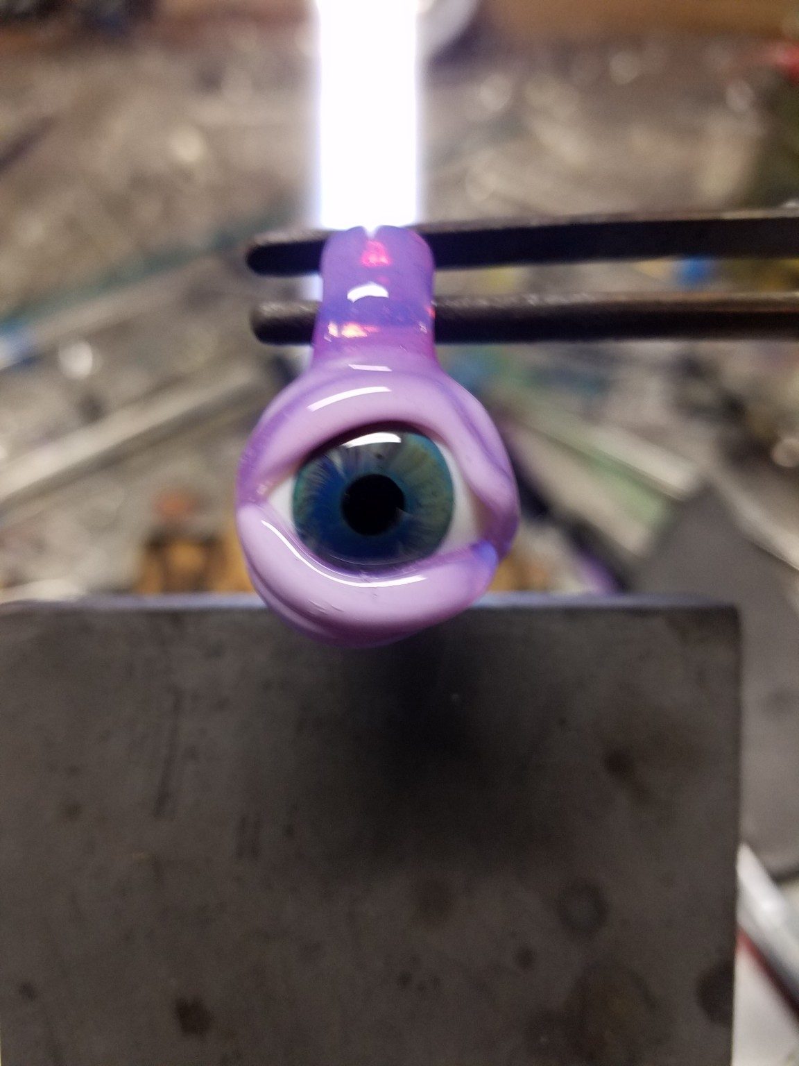 Glass pendant being made by Jose Valdes