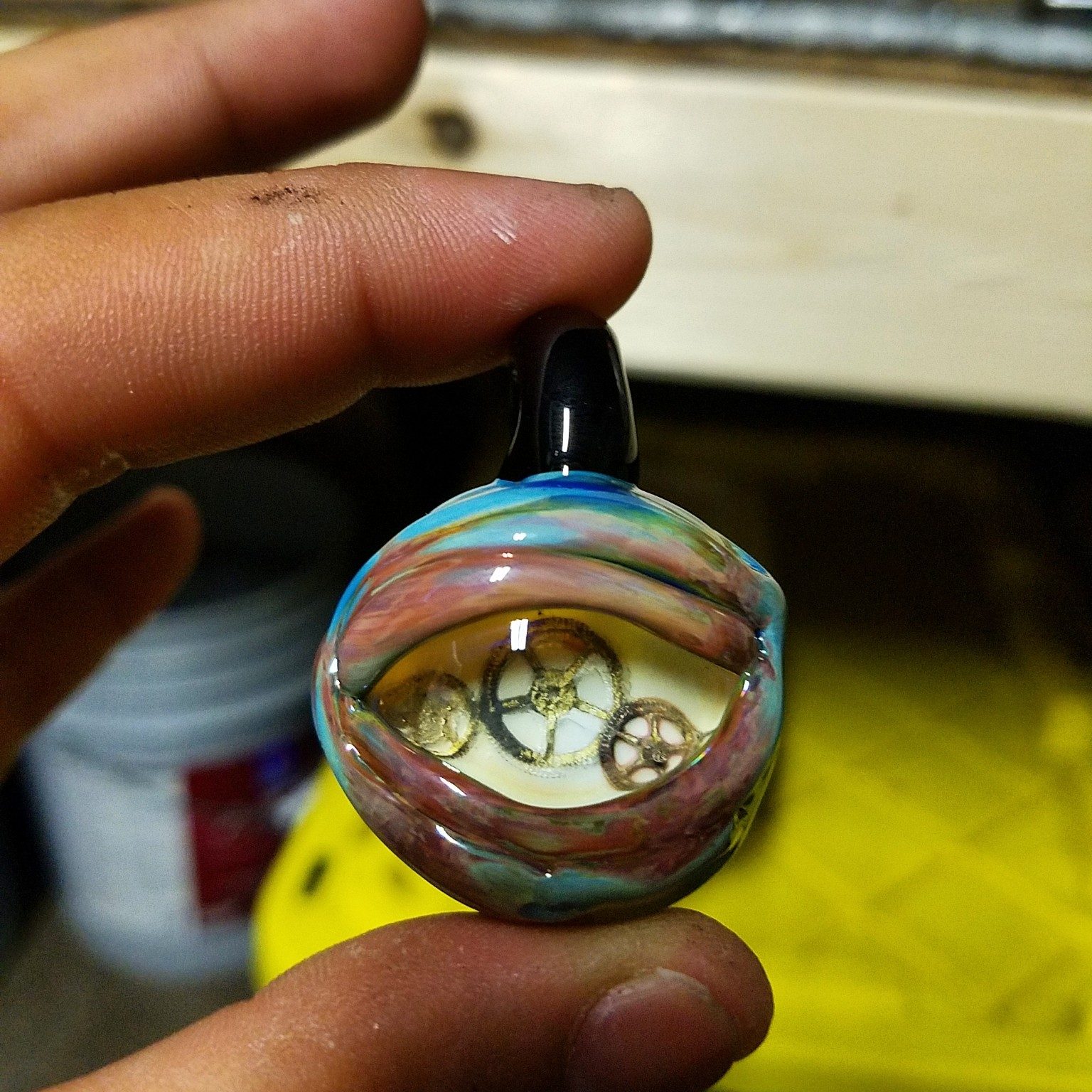 Glass pendant being made by Jose Valdes