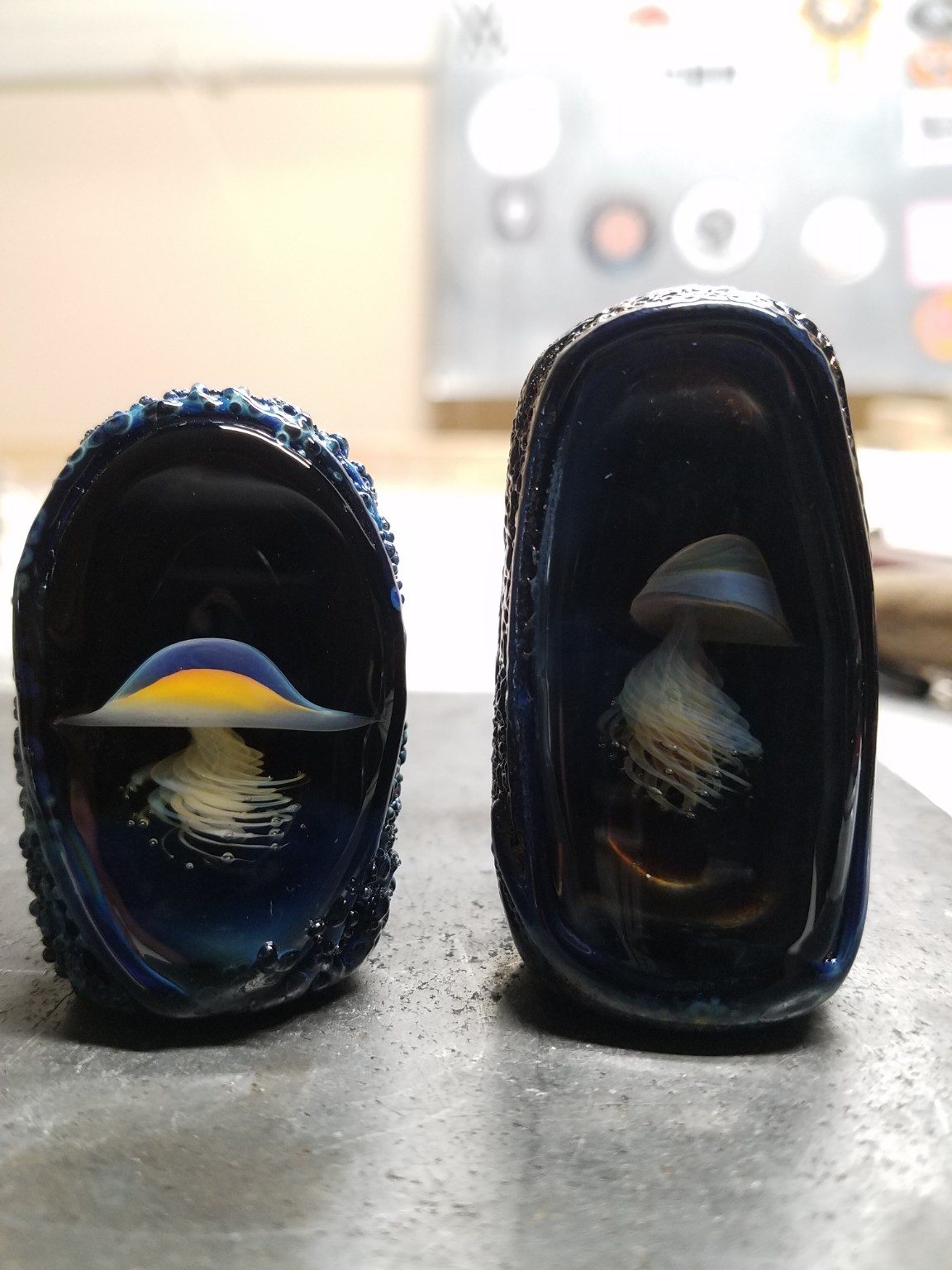 Pair of space-themed borosilicate pendants by Jose Valdes